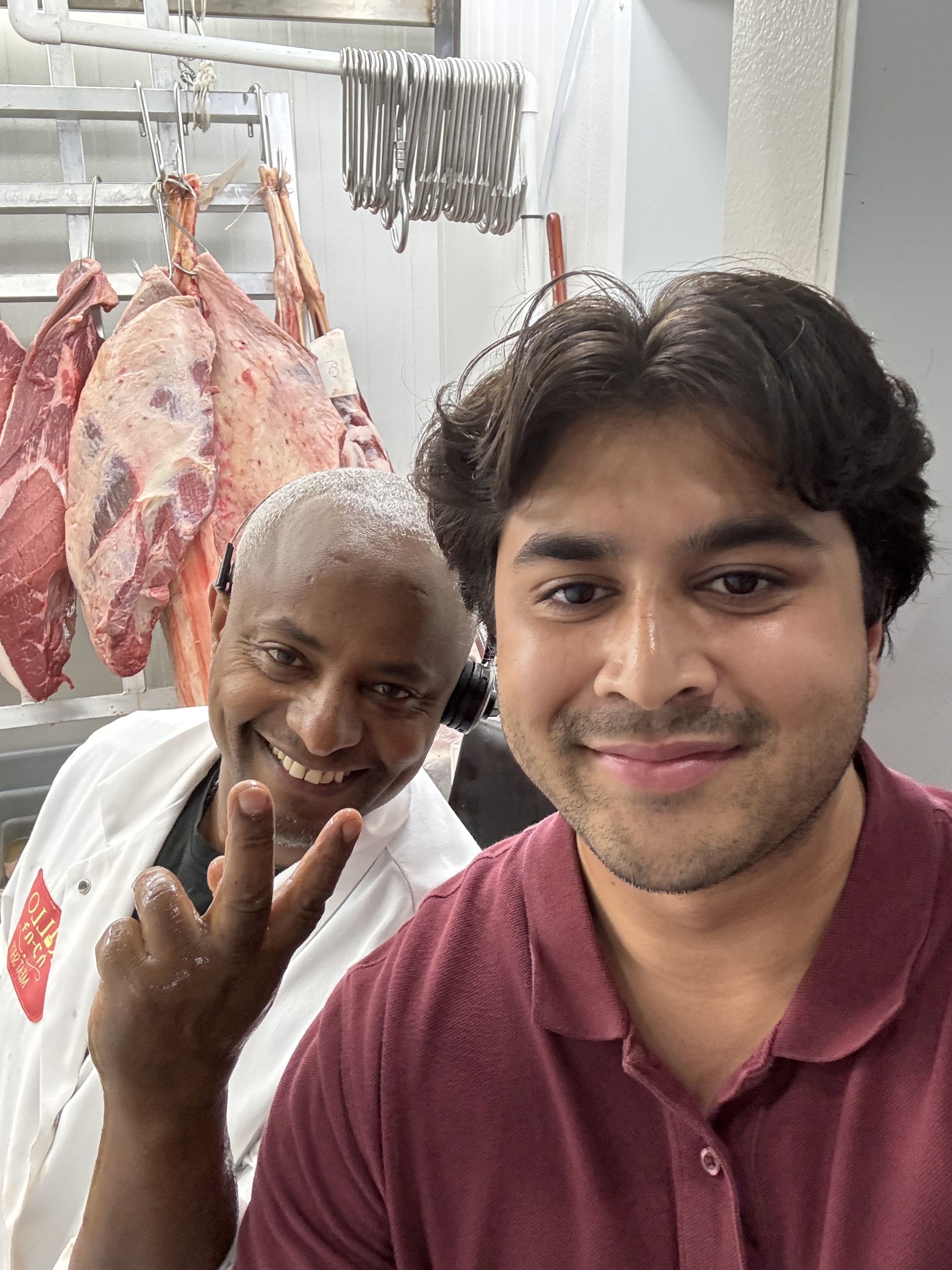 Asad with 4 Kilo Butcher Shop owner